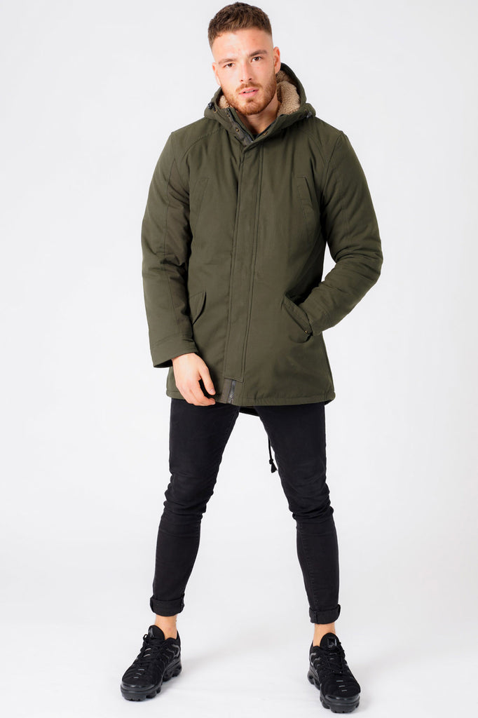 Welker Borg Lined Hooded Parka Coat with Fishtail Hem in Rosin Green - –  Tokyo Laundry
