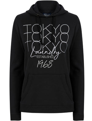 Areli Embroidered Motif Brushback Fleece Pullover Hoodie in Jet Black - Tokyo Laundry