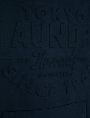 Tides Embossed Motif Brushback Fleece Pullover Hoodie in Sky Captain Navy - Tokyo Laundry