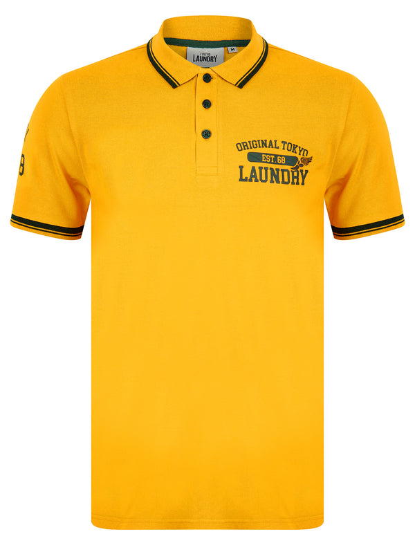 Fotos Cotton Pique Polo Shirt in Artisan's Gold - Tokyo Laundry