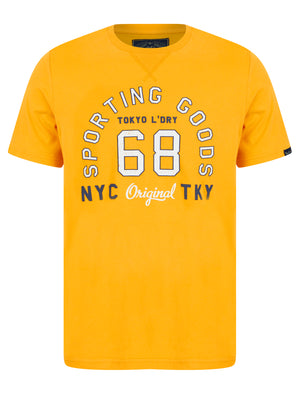 Sporting Goods Motif Cotton Jersey T-Shirt in Artisan's Gold - Tokyo Laundry