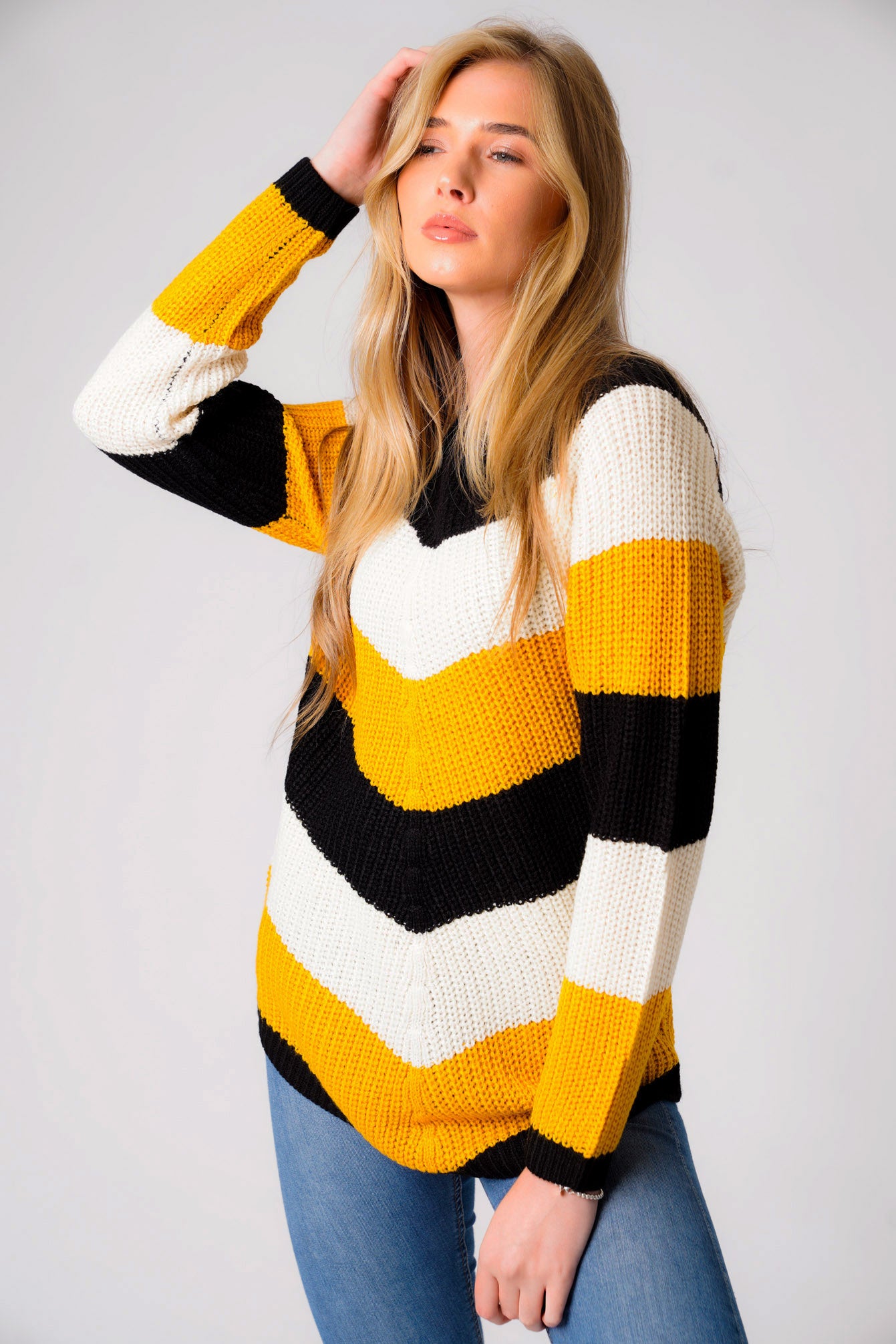 Yellow and black striped jumper on sale