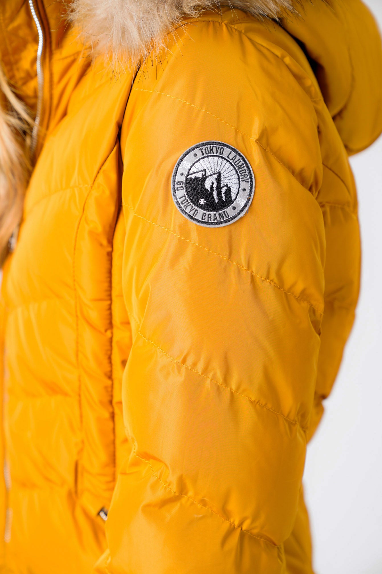 Jaboris Fur Funnel Neck Longline Quilted Puffer Coat in Mustard - Toky –  Tokyo Laundry