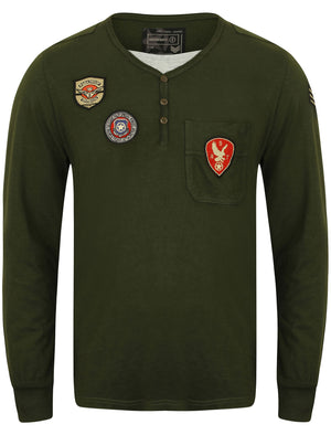 Mowder Long Sleeve Top with Embroidered Badges in Olive Night - Dissident