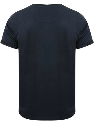 Akamu Printed Roll Sleeve T-Shirt with Pocket in True Navy - Tokyo Laundry