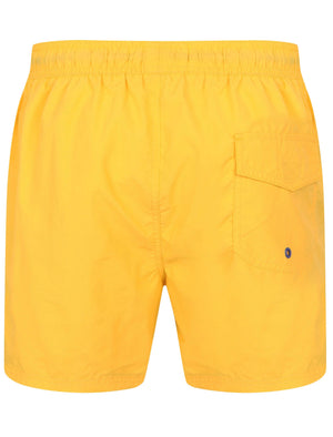 Tauri Classic Swim Shorts In Solar Yellow - Tokyo Laundry